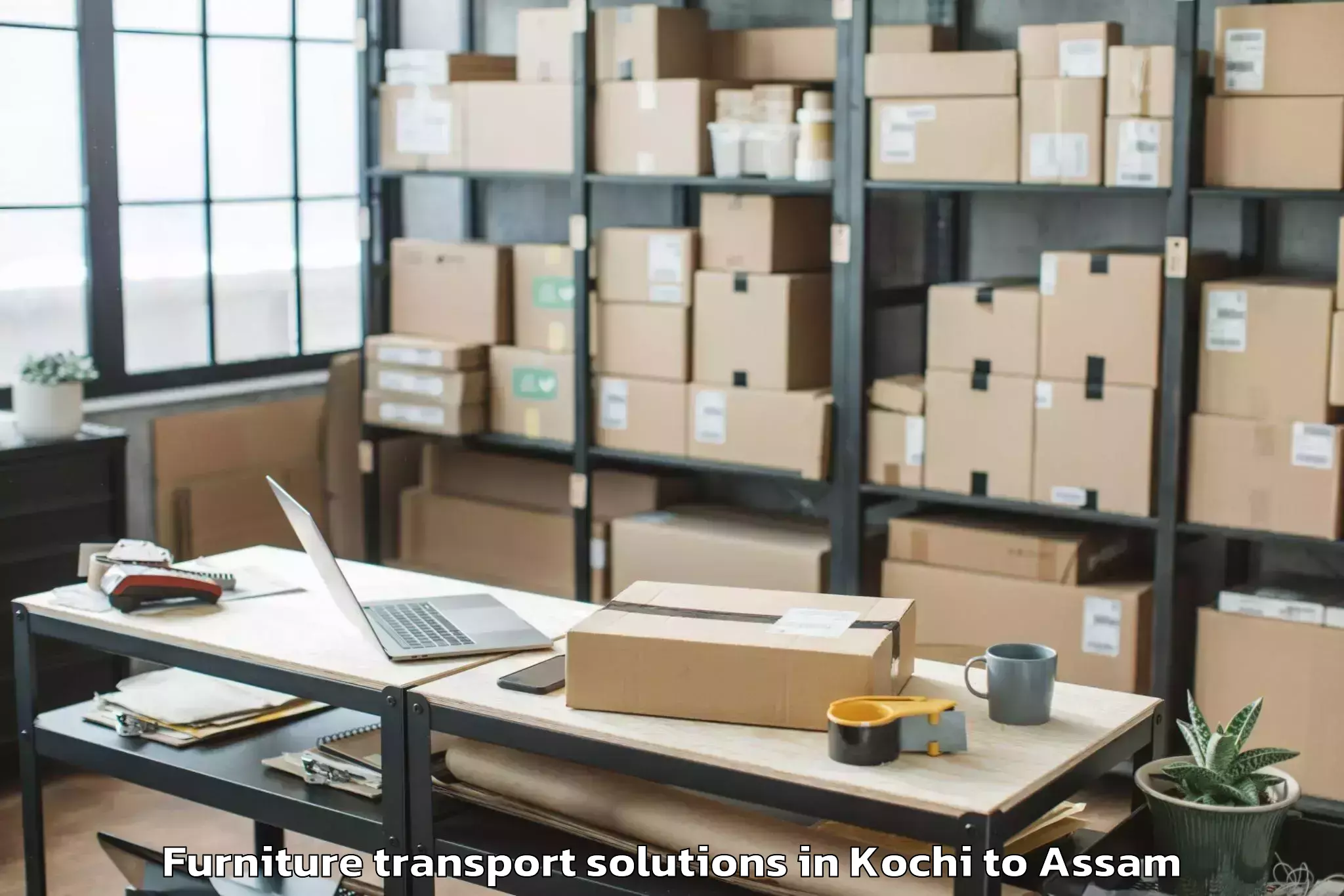 Professional Kochi to Digboi Furniture Transport Solutions